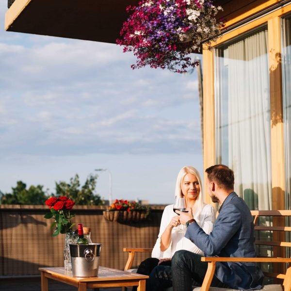 young-couple-enjoying-drink-restaurant (1)